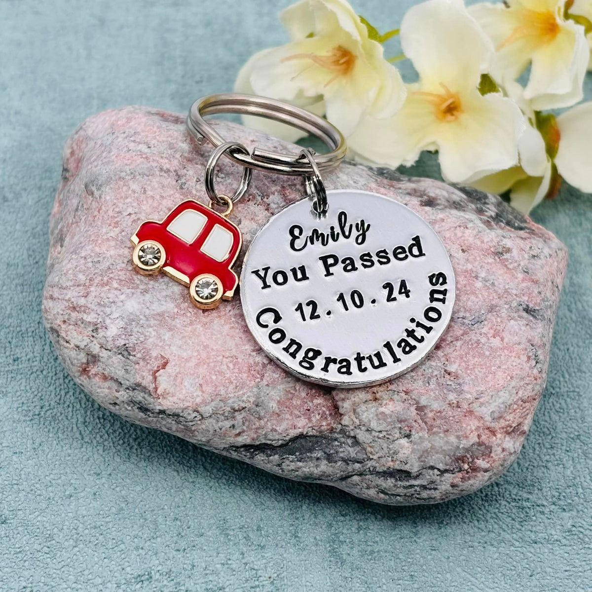 Emily personalised You Passed congratulations keyring with date and red car charm