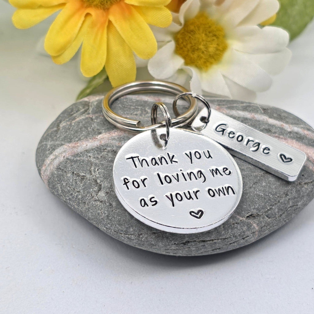 Hand stamped thank you keyring for step parent on grey stone with flowers