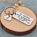Personalised It Started With a Message keyring with a date, time and initial heart tag on a wood slice
