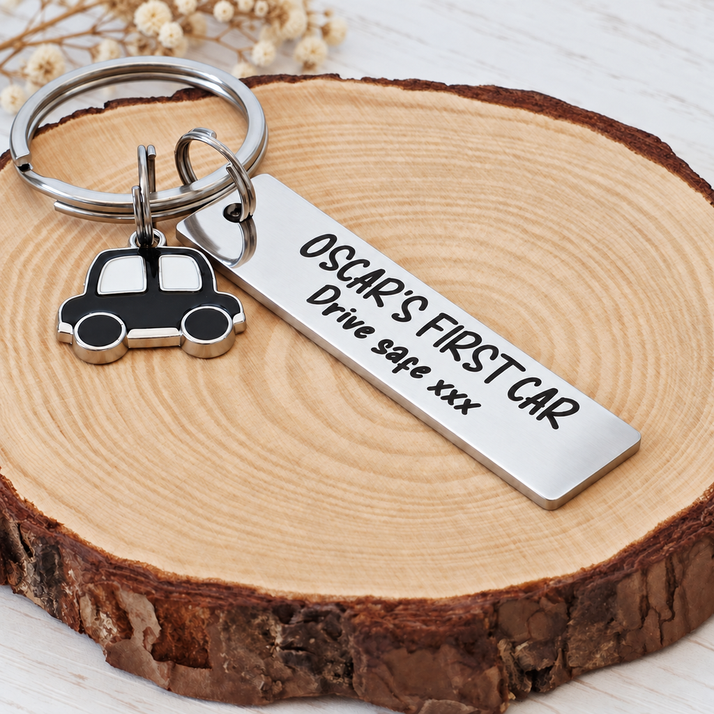 Personalised first car keyring displayed with dried flowers