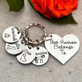 Personalised This Human Belongs To heart keyring with round pet name tags and rabbit, dog, cat and horse illustrations
